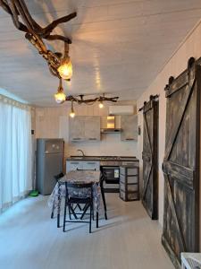 A kitchen or kitchenette at Camping Dal Pino