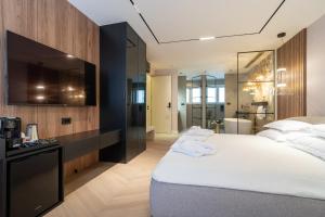 Ein Bett oder Betten in einem Zimmer der Unterkunft Luxury Rooms - FOR GIFT