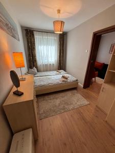 Ένα ή περισσότερα κρεβάτια σε δωμάτιο στο Brigitte Apartments +28 φωτογραφίες
