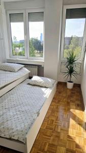 Postel nebo postele na pokoji v ubytování Apartment 10