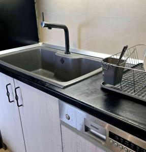 Kuchyň nebo kuchyňský kout v ubytování Apartment 10