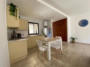 Kuchyň nebo kuchyňský kout v ubytování El Olivar Corazón Urbano