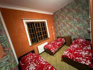 Postel nebo postele na pokoji v ubytování Backpackers Georgia