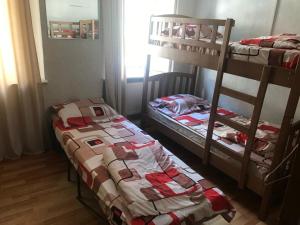 Postel nebo postele na pokoji v ubytování Backpackers Georgia