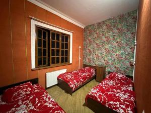 Postel nebo postele na pokoji v ubytování Backpackers Georgia