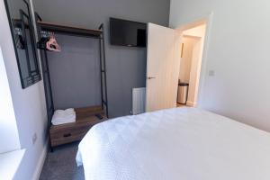 Postel nebo postele na pokoji v ubytování Spindrift