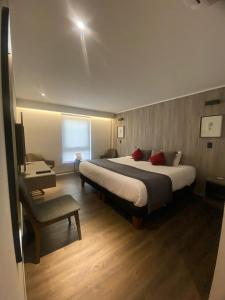 Postel nebo postele na pokoji v ubytování Hotel H9