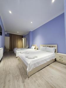 Katil atau katil-katil dalam bilik di Hotel N