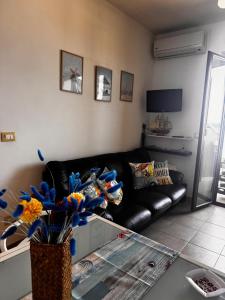 TV a/nebo společenská místnost v ubytování Stella Marina + 6 fotografií