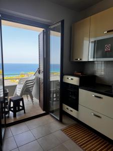 Kuchyň nebo kuchyňský kout v ubytování Stella Marina