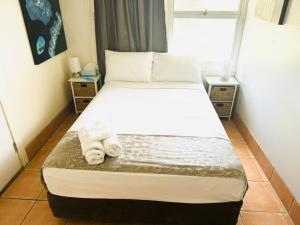 Postel nebo postele na pokoji v ubytování Motel Ingham