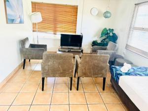 TV a/nebo společenská místnost v ubytování Motel Ingham