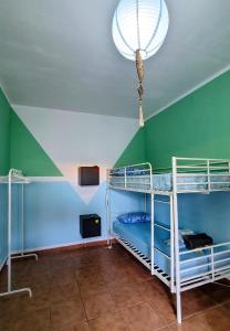 Letto o letti in una camera di Eden GuestHouse