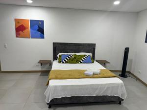 Ένα ή περισσότερα κρεβάτια σε δωμάτιο στο Confortable Aparta Loft 903 Aiana Verde