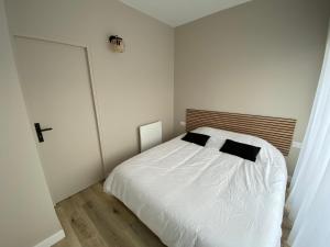 Postel nebo postele na pokoji v ubytování Appartement proche plage