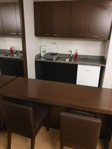 Η κουζίνα ή μικρή κουζίνα στο Bonaparte Blue Residence - Flat Particular