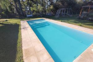 Πισίνα στο ή κοντά στο La Arbolada Casa Quinta