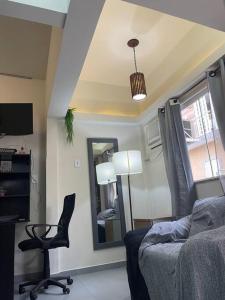 Et tv og/eller underholdning på Confortável loft 4,ar, Wi-Fi, TV, 400m UNIG