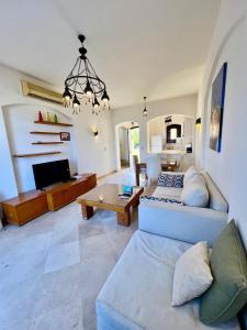 TV a/nebo společenská místnost v ubytování wast golf y 39-0-2