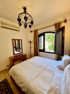 Postel nebo postele na pokoji v ubytování wast golf y 39-0-2 + 22 fotografií