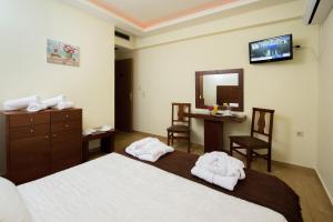 Cama o camas de una habitación en Olympion
