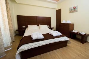 Cama o camas de una habitación en Olympion