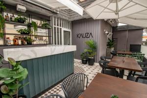Uma TV ou centro de entretenimento em TARATA BOUTIQUE HOTEL