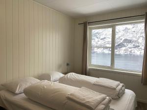 Postel nebo postele na pokoji v ubytování Winjum Apartments Aurland Stegastein