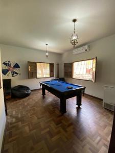 a living room with a pool table in it at República Os Bartira in Ouro Preto