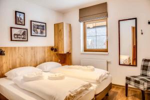 Posteľ alebo postele v izbe v ubytovaní Holiday Homes Obertraun - Oberösterreich 86