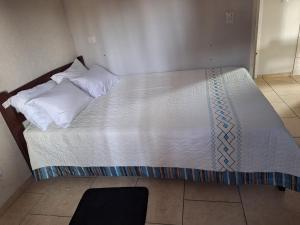 Postel nebo postele na pokoji v ubytování Pousada Recanto turmalina