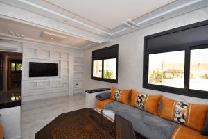 TV a/nebo společenská místnost v ubytování Appartement Dalisa