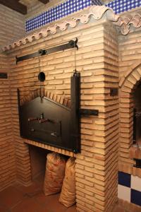 TV a/nebo společenská místnost v ubytování Hotel Rural Romero Torres