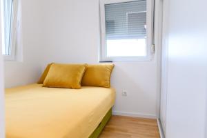 Una cama o camas en una habitación de Viktor i Kasija green hill