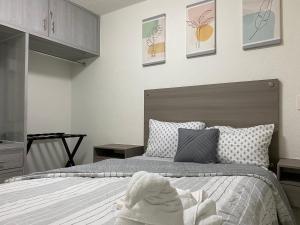 Ένα ή περισσότερα κρεβάτια σε δωμάτιο στο CaprichoMarina +12 φωτογραφίες