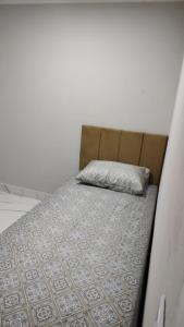 Katil atau katil-katil dalam bilik di Wana casa 3 requinte e conforto +16 gambar