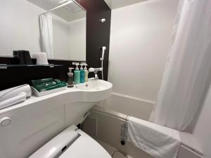 Koupelna v ubytování Hotel Route Inn Rifu