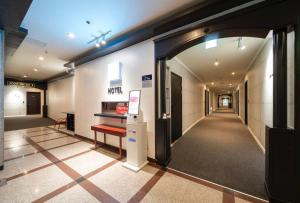 TV a/nebo společenská místnost v ubytování Ilsan Noble Hotel
