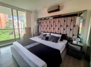 Class suites nirvana客房内的一张或多张床位