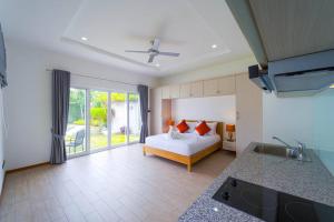 Ένα ή περισσότερα κρεβάτια σε δωμάτιο στο 4 Bedroom Private Pool Villa - MR51 +87 φωτογραφίες