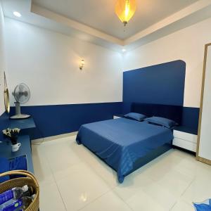 Giường trong phòng chung tại Khách Sạn Tây Ninh LaNa