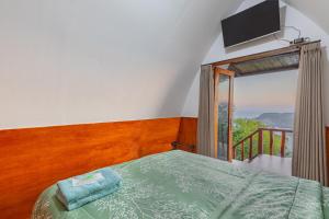Postel nebo postele na pokoji v ubytování Baron Beach Bungalow