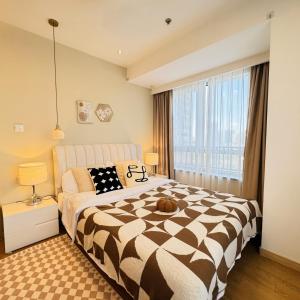 Postel nebo postele na pokoji v ubytování Shanghai Lerongju Boutique Apartment Metro Line 8 20meter