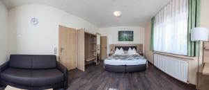 เตียงในห้องที่ Hotel Lorca