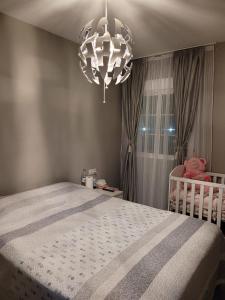 Ένα ή περισσότερα κρεβάτια σε δωμάτιο στο Apartamento Garucha Playa