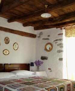 A bed or beds in a room at Casa Di Alfredo B&B - CITR9039