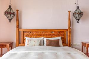Rúm í herbergi á Kenting Shen's Homestay