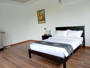 Katil atau katil-katil dalam bilik di Ream Yoho Hotel