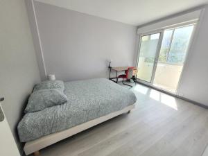 Postel nebo postele na pokoji v ubytování Appartement T4