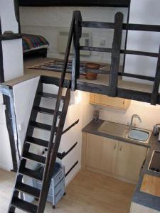 A kitchen or kitchenette at Thatched Farm Holiday Cottages 